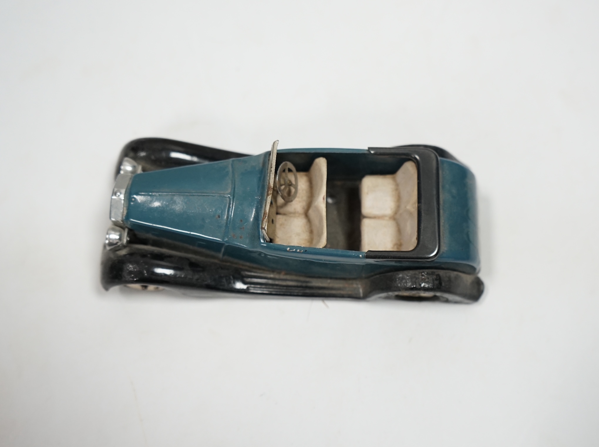 A Tri-ang Minic clockwork tinplate Rolls Royce Tourer, with aqua blue body, and black running boards, with its original box. Condition - fair, fatigue and missing parts to original tyres as would be expected, significant